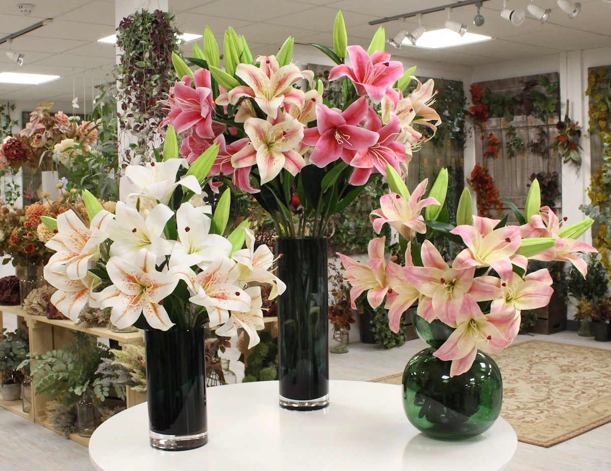 Lilies in Glass Vases